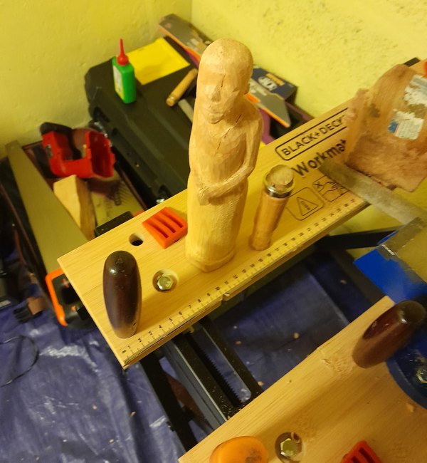 Figure being carved in the studio